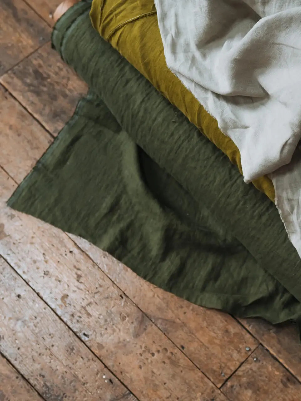 Roll_of_green_linen.webp