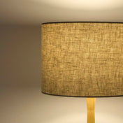 Natural linen lampshade in textured linen illuminated