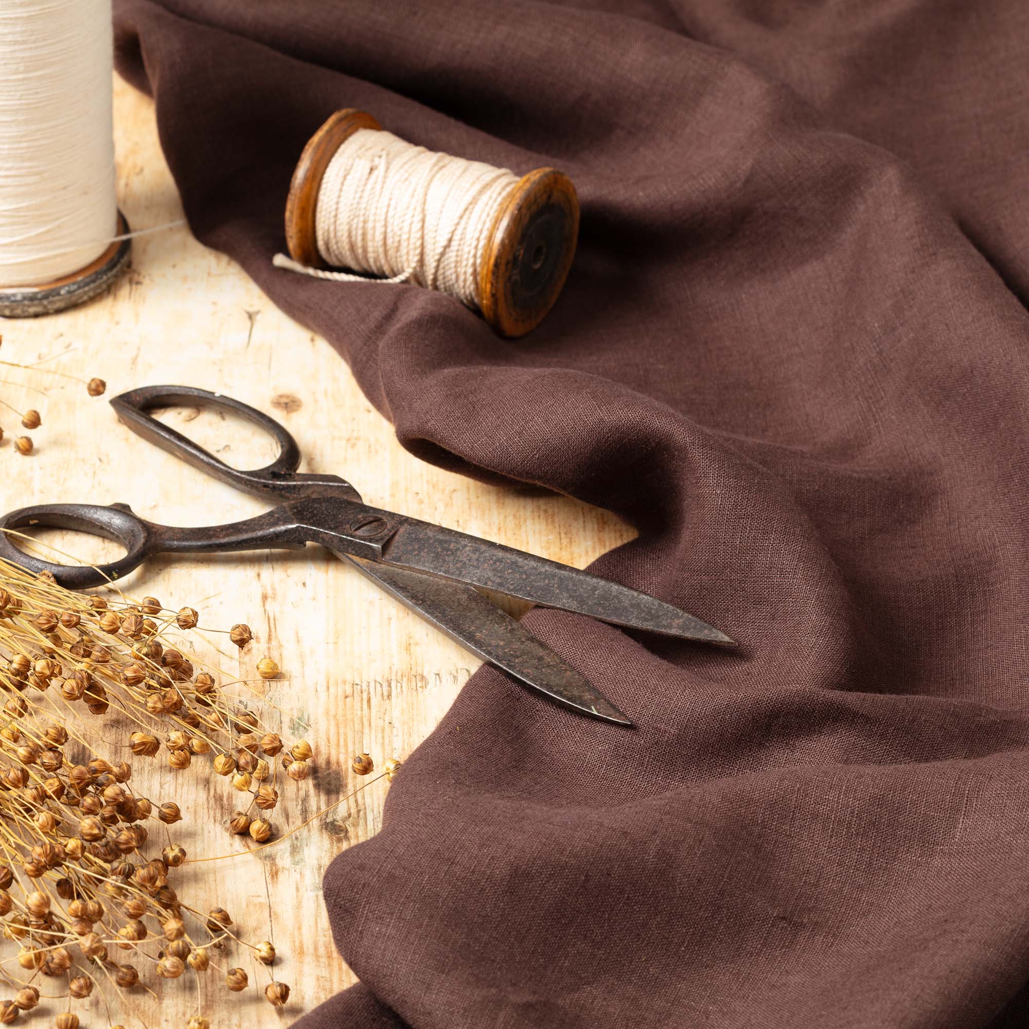 DarkBrownLinenFabricWoodenCuttingTable.jpg