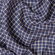 Navy Check linen fabric, crumpled to show its natural texture, washed European flax