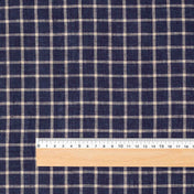 Navy Check linen fabric, flat lay with ruler showing its natural weave, washed European flax