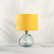 Honey yellow lampshade in textured linen on recycled glass table lamp