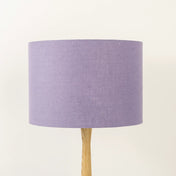 Lavender lampshade made from textured linen on wooden stand