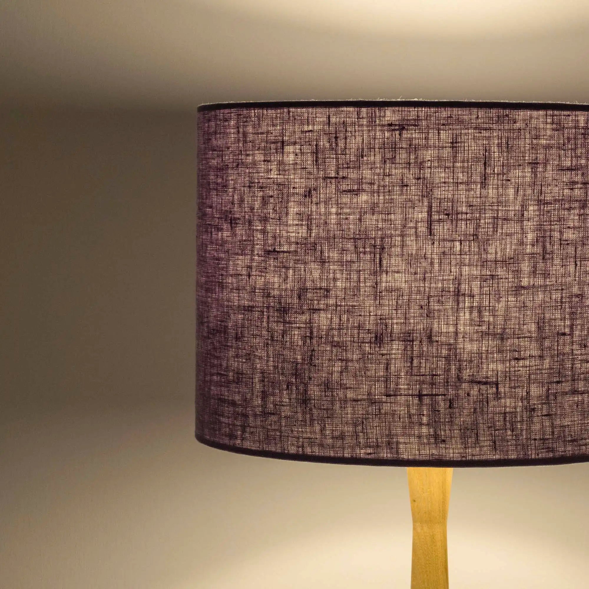 Lavender lampshade in textured linen illuminated 