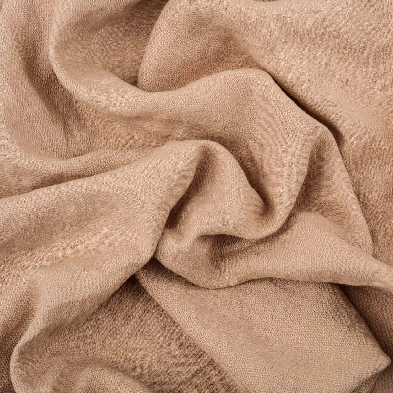 Pastel Pink Nude linen fabric, crumpled to show its natural texture, washed European flax