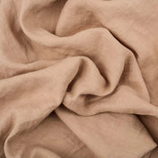Pastel Pink Nude linen fabric, crumpled to show its natural texture, washed European flax