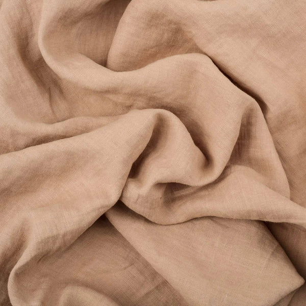 Pastel Pink Nude linen fabric, crumpled to show its natural texture, washed European flax