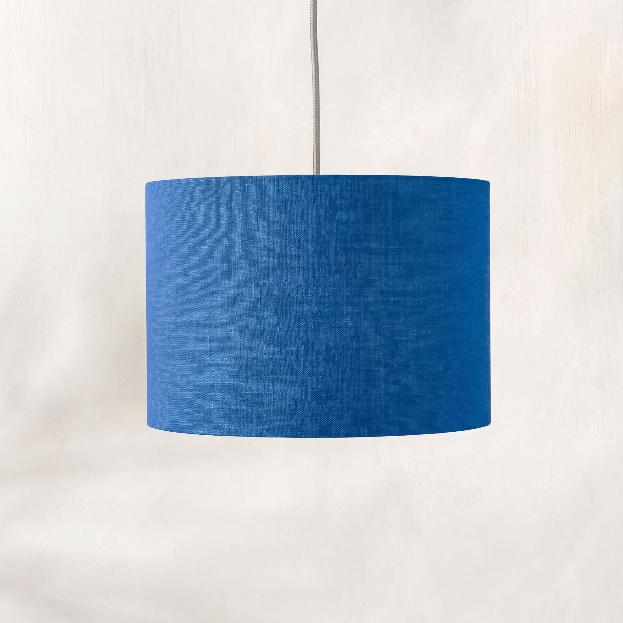 sapphire-blue-linen-ceiling-lampshade_1f77f98d-fd6a-46ee-8ba9-bfa22538c8f5.jpg