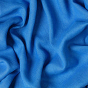 Sapphire Blue linen fabric, crumpled to show its natural texture, washed European flax