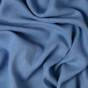 Steel Blue linen fabric, crumpled to show its natural texture, washed European flax