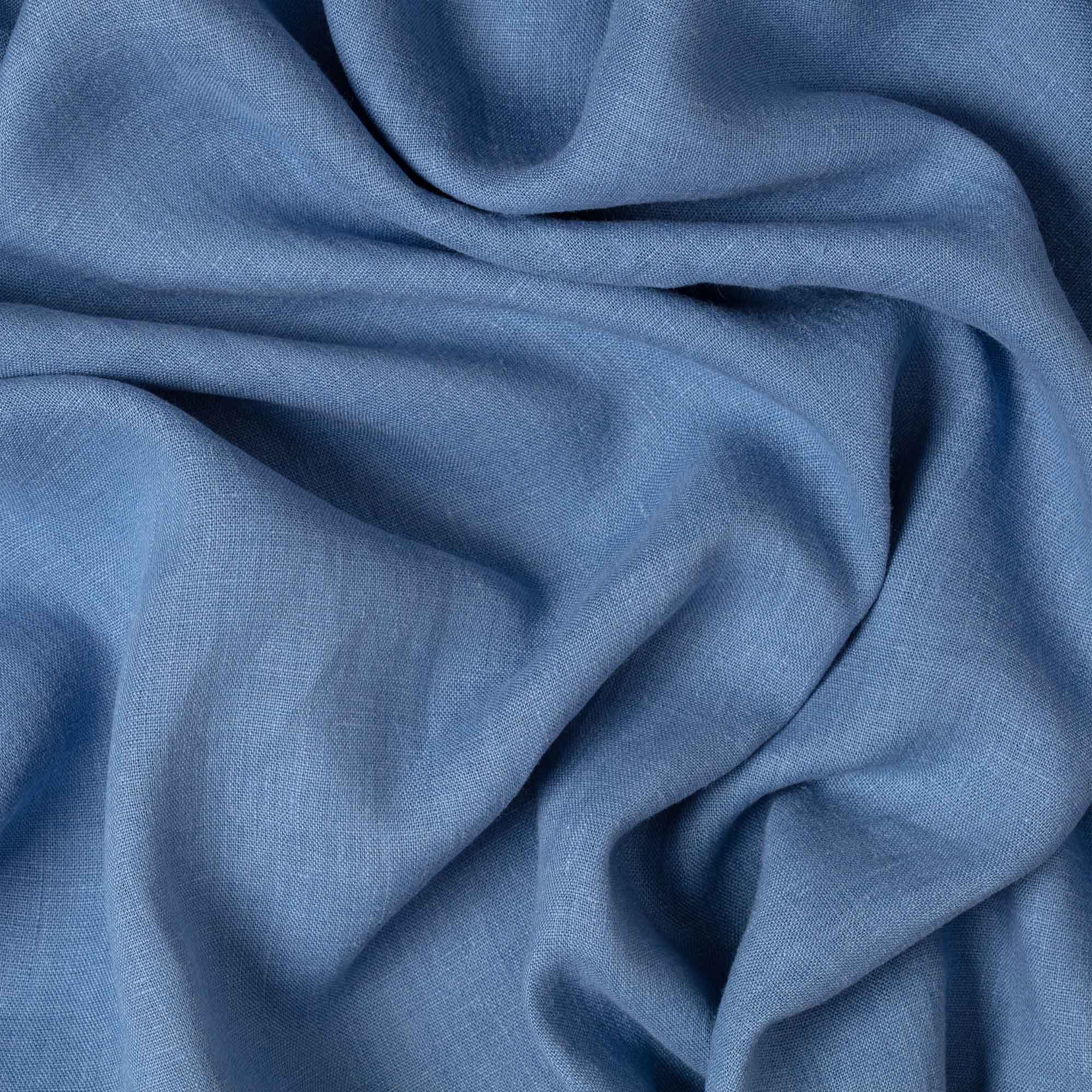 Steel Blue linen fabric, crumpled to show its natural texture, washed European flax