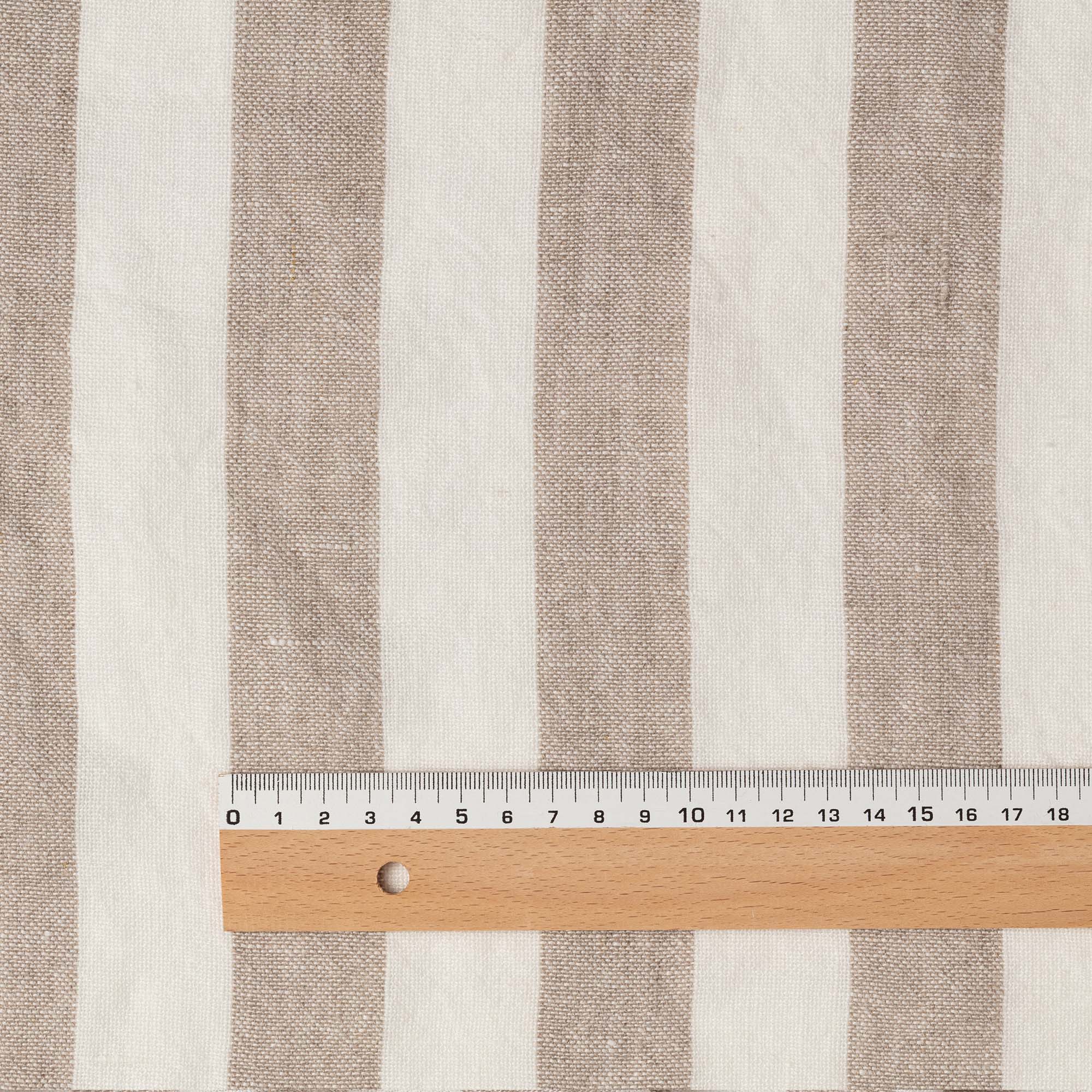 Wide Heavyweight Natural & White Stripes linen fabric, flat lay with ruler showing its natural weave, washed European flax