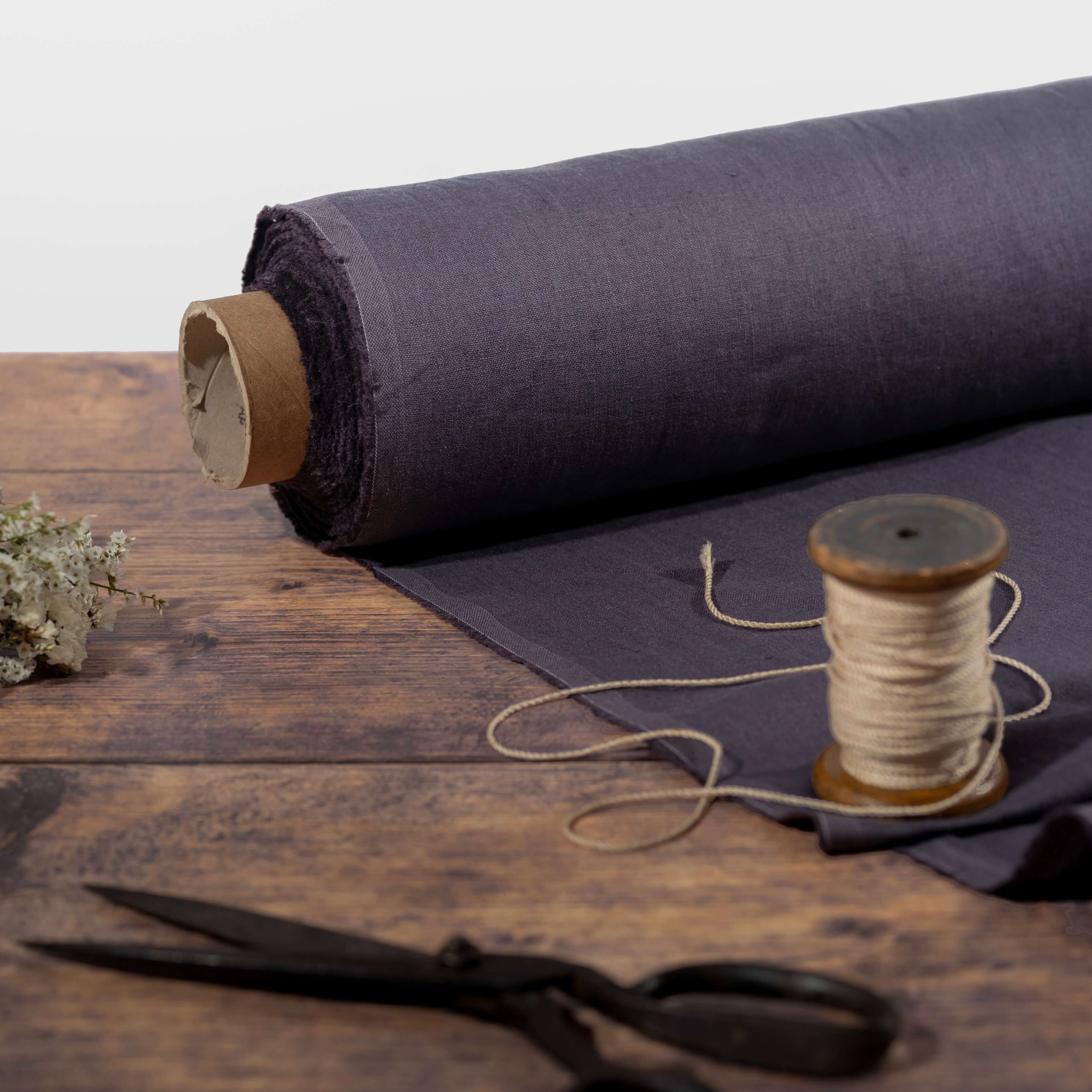 CharcoalGreyLinenFabriconRollwithScissors.jpg