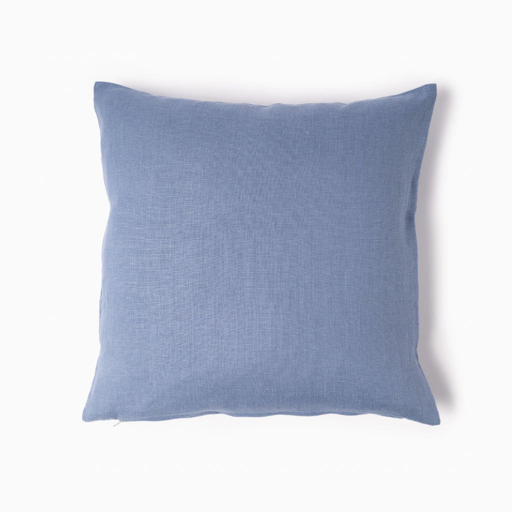 Dusty blue linen cushion cover on white background