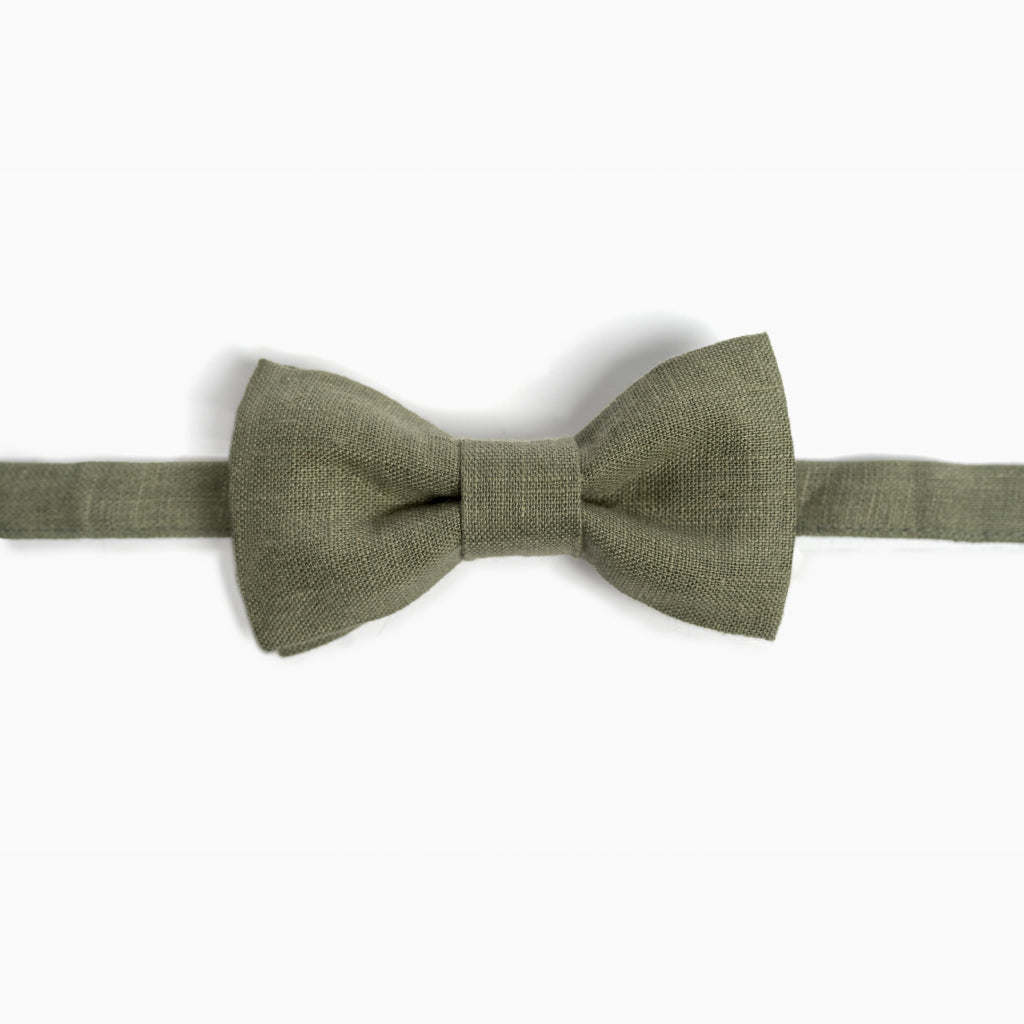 Dusty sage green linen bow tie on white background