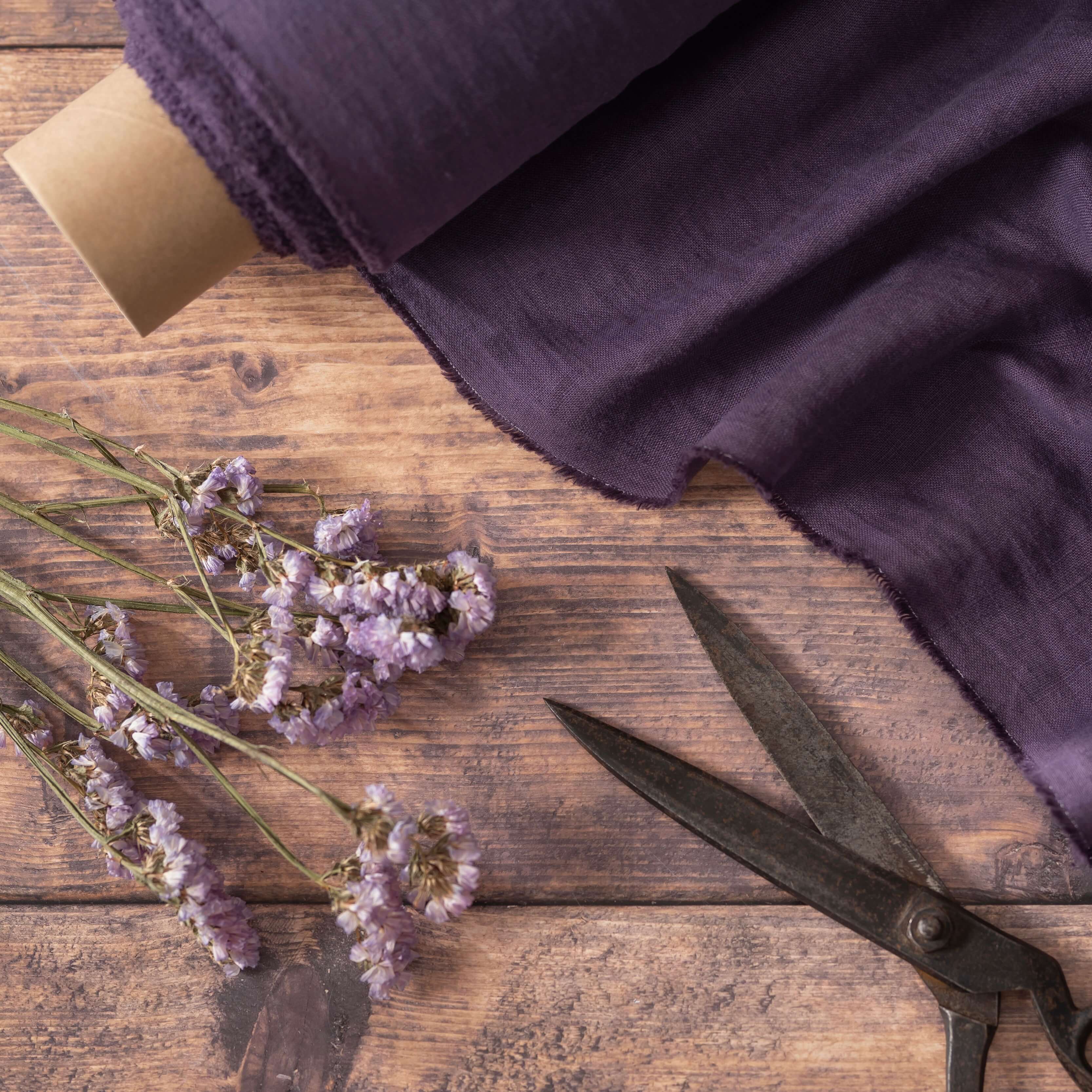 Grape Purple linen fabric, ready to cut, with scissors and dried flowers