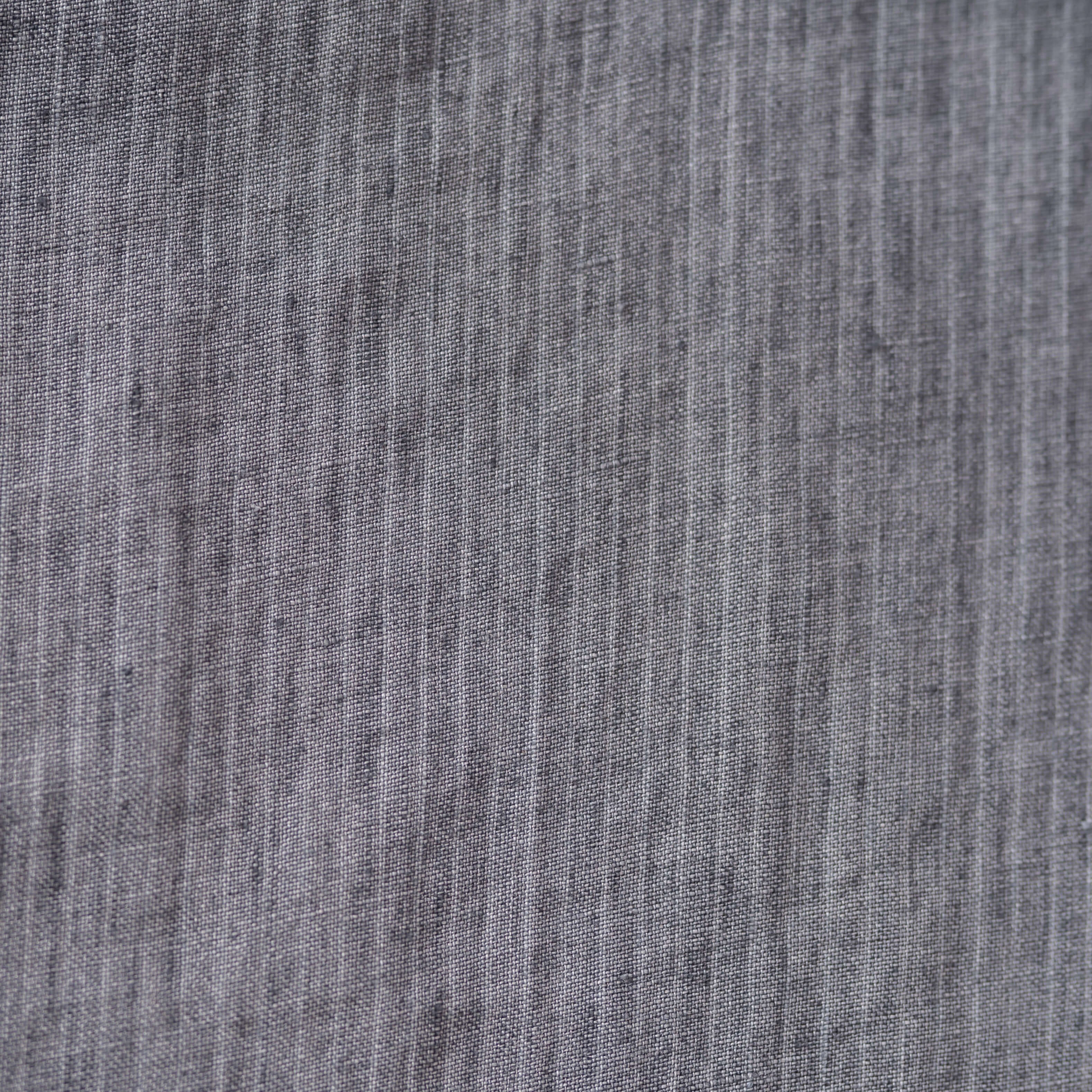 Grey Stripes Mélange linen fabric, flat lay showing its natural weave, washed European flax