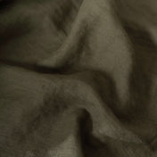 Khaki Green linen fabric, crumpled to show its natural texture, washed European flax