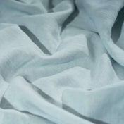 Light Duck Egg Blue linen fabric, crumpled to show its natural texture, washed European flax