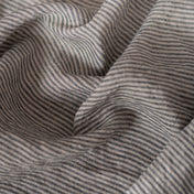 Natural & Grey Stripes linen fabric, crumpled to show its natural texture, washed European flax