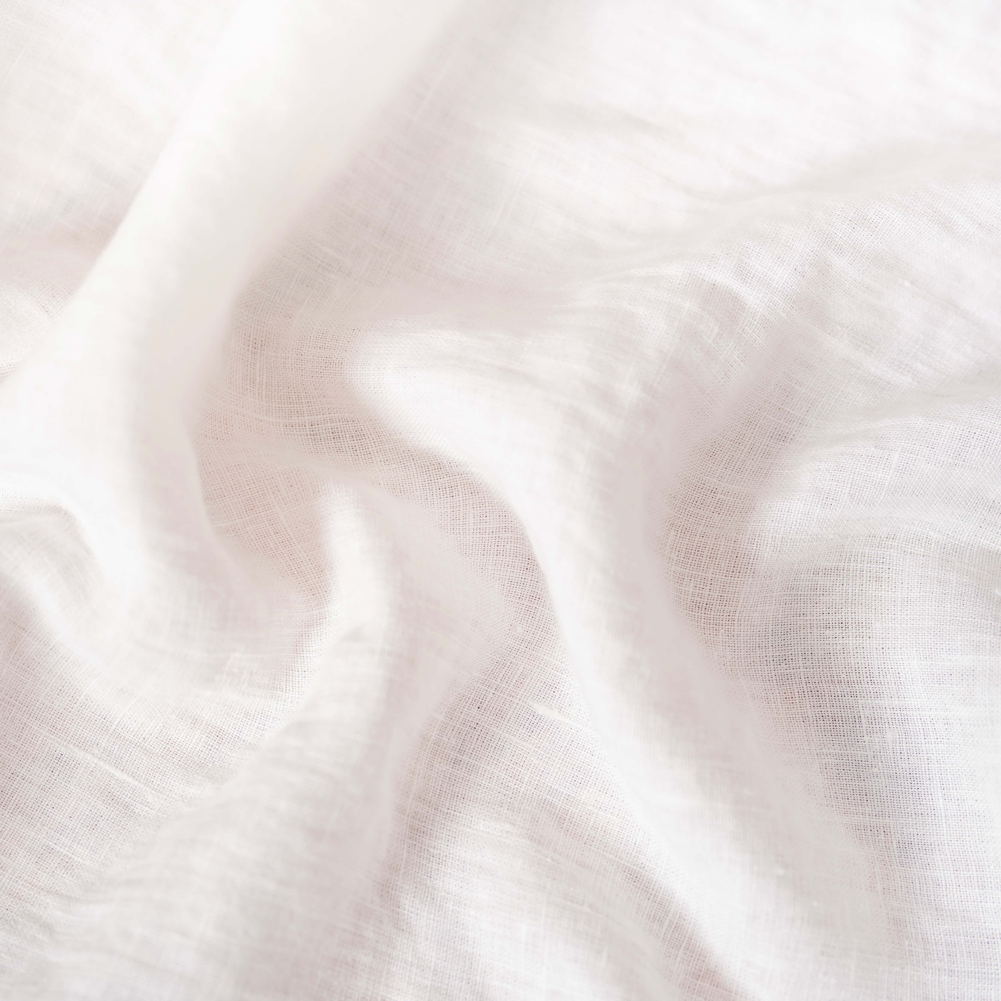 Off White linen fabric, crumpled to show its natural texture, washed European flax