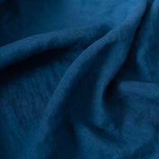 Petrol Blue linen fabric, crumpled to show its natural texture, washed European flax