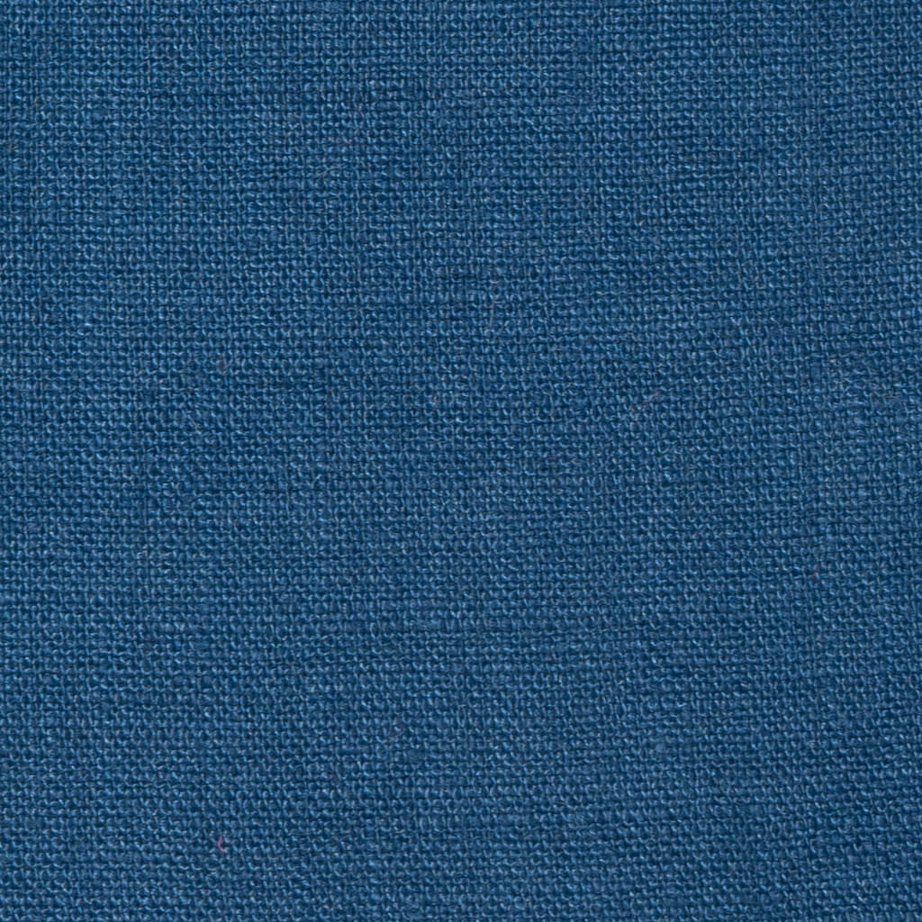 Petrol Blue linen fabric, flat lay showing its natural weave, washed European flax