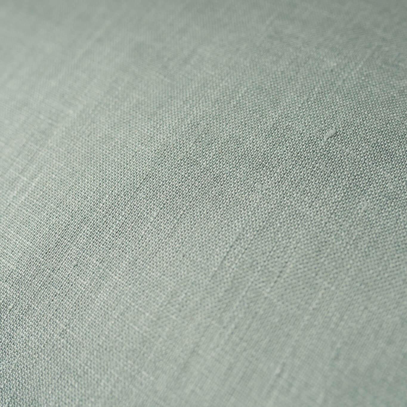 Close up of dusty turquoise linen fabric