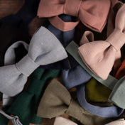 Close up of collection of colourful linen bow ties
